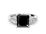 White gold Three-Stone Fancy Black Princess Cut Diamond Ring with Pear Side Stones and Four-Prong Setting