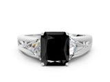 White gold Three-Stone Fancy Black Radiant Cut Cut Diamond Ring with Trillion Side Stones on a Split Shank Band