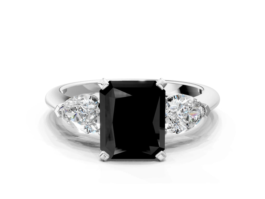 White gold Three-Stone Fancy Black Radiant Cut Diamond Ring with Pear Side Stones and Four-Prong Setting