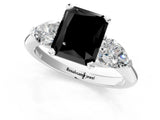 White gold Three-Stone Fancy Black Radiant Cut Diamond Ring with Pear Side Stones and Four-Prong Setting_1