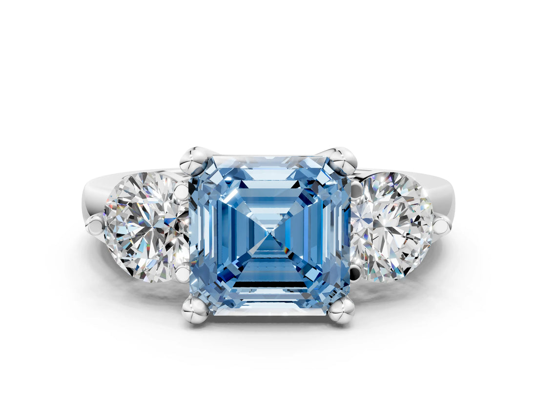 White gold Three-Stone Fancy Blue Asscher  Brilliant Cut Solitaire Ring with Prong Setting on a Classic Band
