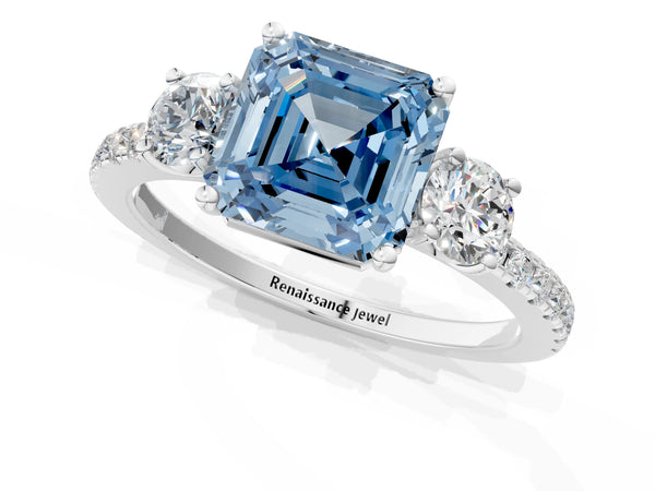 Platinum Three-Stone Fancy Blue Asscher Cut Cut Diamond Pavé Band with Prong Setting