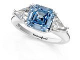 White gold Three-Stone Fancy Blue Asscher Cut Cut Diamond Ring with Trillion Side Stones and Four-Prong Setting_12
