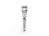 White gold Three-Stone Fancy Blue Cushion Cut Cut Diamond Ring with Channel-Set Band and Prong Setting_2