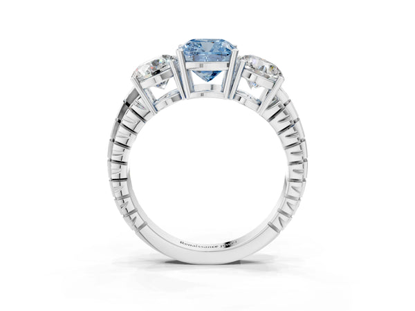 Platinum Three-Stone Fancy Blue Cushion Cut Cut Diamond Ring with Channel-Set Band and Prong Setting