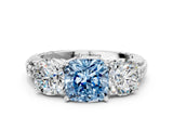 White gold Three-Stone Fancy Blue Cushion Cut Cut Diamond Ring with Channel-Set Band and Prong Setting