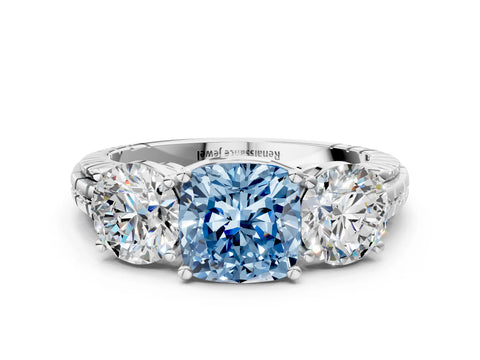 White gold Three-Stone Fancy Blue Cushion Cut Cut Diamond Ring with Channel-Set Band and Prong Setting
