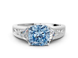 White gold Three-Stone Fancy Blue Cushion Cut Cut Diamond Ring with Trillion Side Stones on a Split Shank Band