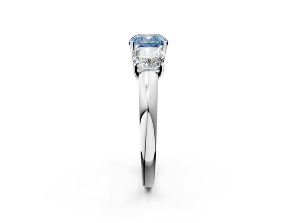 White gold Fancy Blue Cushion Cut Diamond Three-Stone Ring with Four-Prong Setting and Classic Band