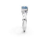 White gold Three-Stone Fancy Blue Cushion Cut Diamond Ring with Round Side Stones, Classic Band, and Four-Prong Setting_2
