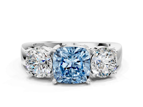 White gold Three-Stone Fancy Blue Cushion Cut Diamond Ring with Round Side Stones, Classic Band, and Four-Prong Setting