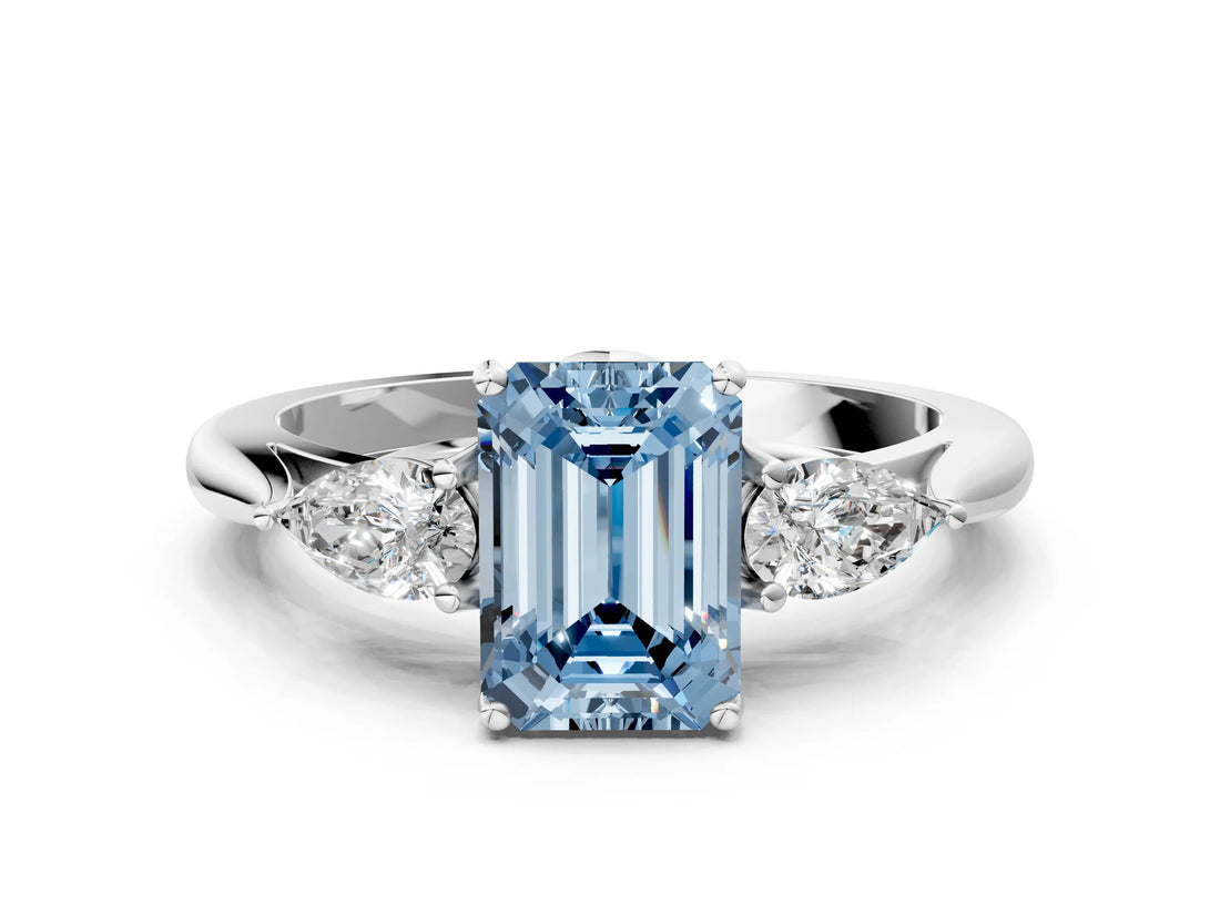 White gold Three-Stone Fancy Blue Emerald Cut Brilliant Diamond Solitaire Ring with Tapered Band and Four-Prong Setting_31