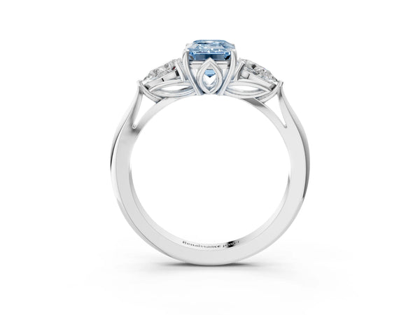 White gold Three-Stone Fancy Blue Emerald Cut Brilliant Diamond Solitaire Ring with Tapered Band and Four-Prong Setting