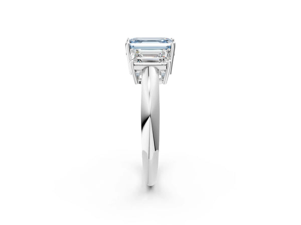 White gold Three-Stone Fancy Blue Emerald Cut Cut Diamond Engagement Ring with Prong Setting on a White Gold Band