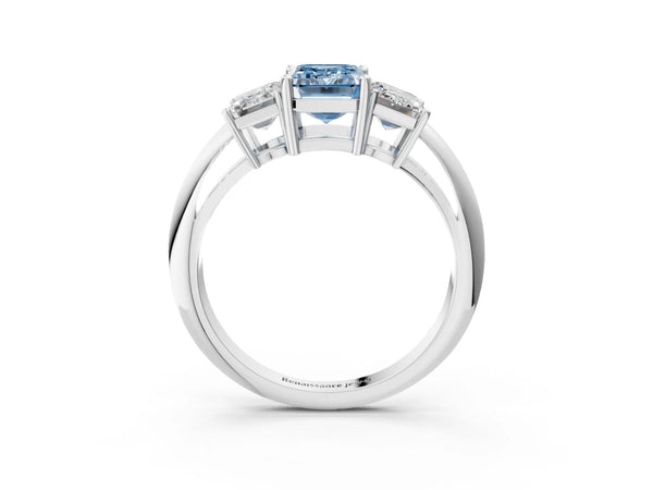 White gold Three-Stone Fancy Blue Emerald Cut Cut Diamond Engagement Ring with Prong Setting on a White Gold Band