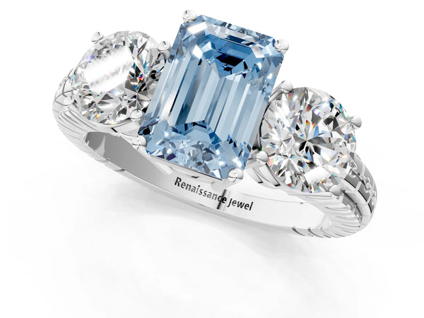 White gold Three-Stone Fancy Blue Emerald Cut Cut Diamond Ring with Channel-Set Band and Prong Setting