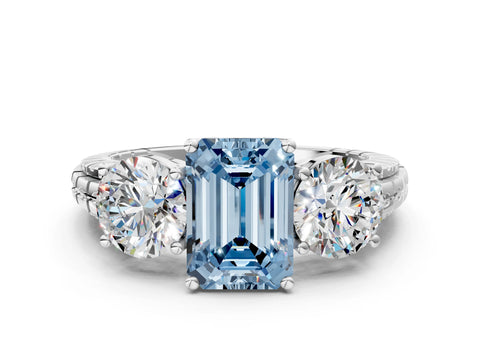 White gold Three-Stone Fancy Blue Emerald Cut Cut Diamond Ring with Channel-Set Band and Prong Setting