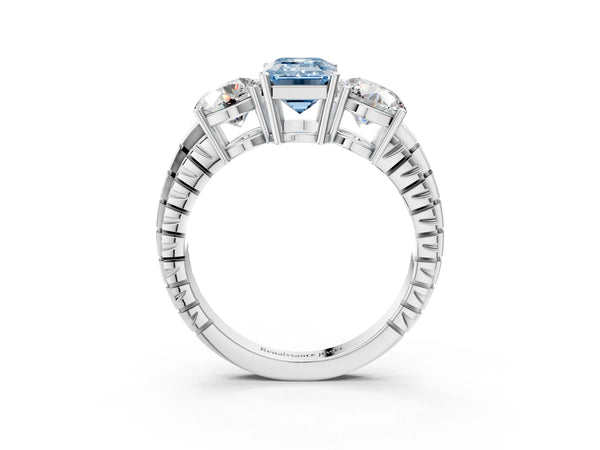 White gold Three-Stone Fancy Blue Emerald Cut Cut Diamond Ring with Channel-Set Band and Prong Setting