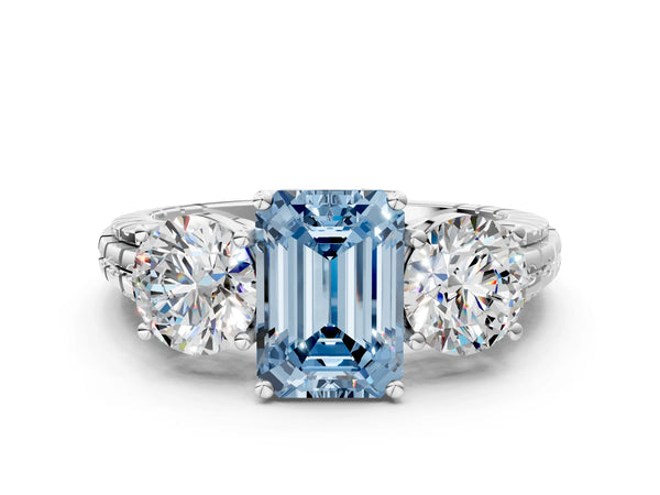White gold Three-Stone Fancy Blue Emerald Cut Cut Diamond Ring with Channel-Set Band and Prong Setting