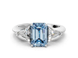 White gold Three-Stone Fancy Blue Emerald Cut Cut Diamond Ring with Trillion Side Stones and Four-Prong Setting_11