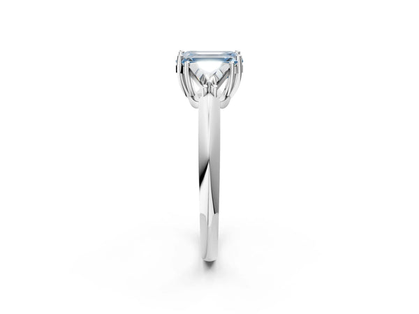 White gold Three-Stone Fancy Blue Emerald Cut Cut Diamond Ring with Trillion Side Stones and Four-Prong Setting