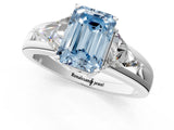 White gold Three-Stone Fancy Blue Emerald Cut Cut Diamond Ring with Trillion Side Stones on a Split Shank Band_1
