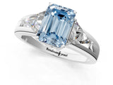 White gold Three-Stone Fancy Blue Emerald Cut Cut Diamond Ring with Trillion Side Stones on a Split Shank Band_31