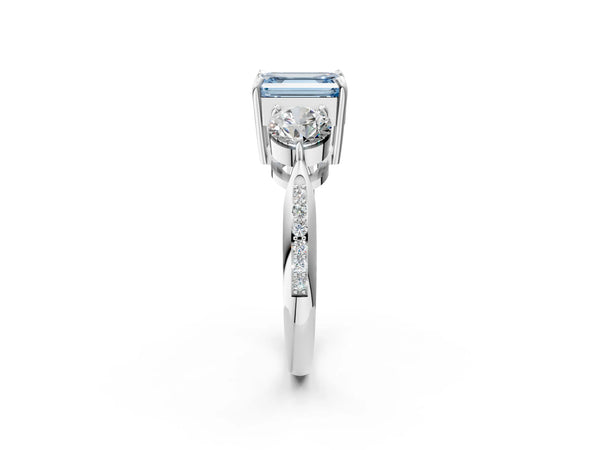 White gold Three-Stone Fancy Blue Emerald Cut Diamond Channel Set Engagement Ring with Prong Setting