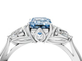 White gold Three-Stone Fancy Blue Emerald Cut Diamond Ring with Pear  Side Stones in Four-Prong Setting_16