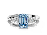 White gold Three-Stone Fancy Blue Emerald Cut Diamond Ring with Pear  Side Stones in Four-Prong Setting_60