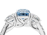 White gold Three-Stone Fancy Blue Emerald Cut Diamond Ring with Round  Pavé Band and Prong Setting_168
