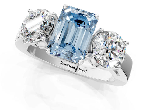 White gold Three-Stone Fancy Blue Emerald Cut Diamond Ring with Round Side Stones, Classic Band, and Four-Prong Setting_1