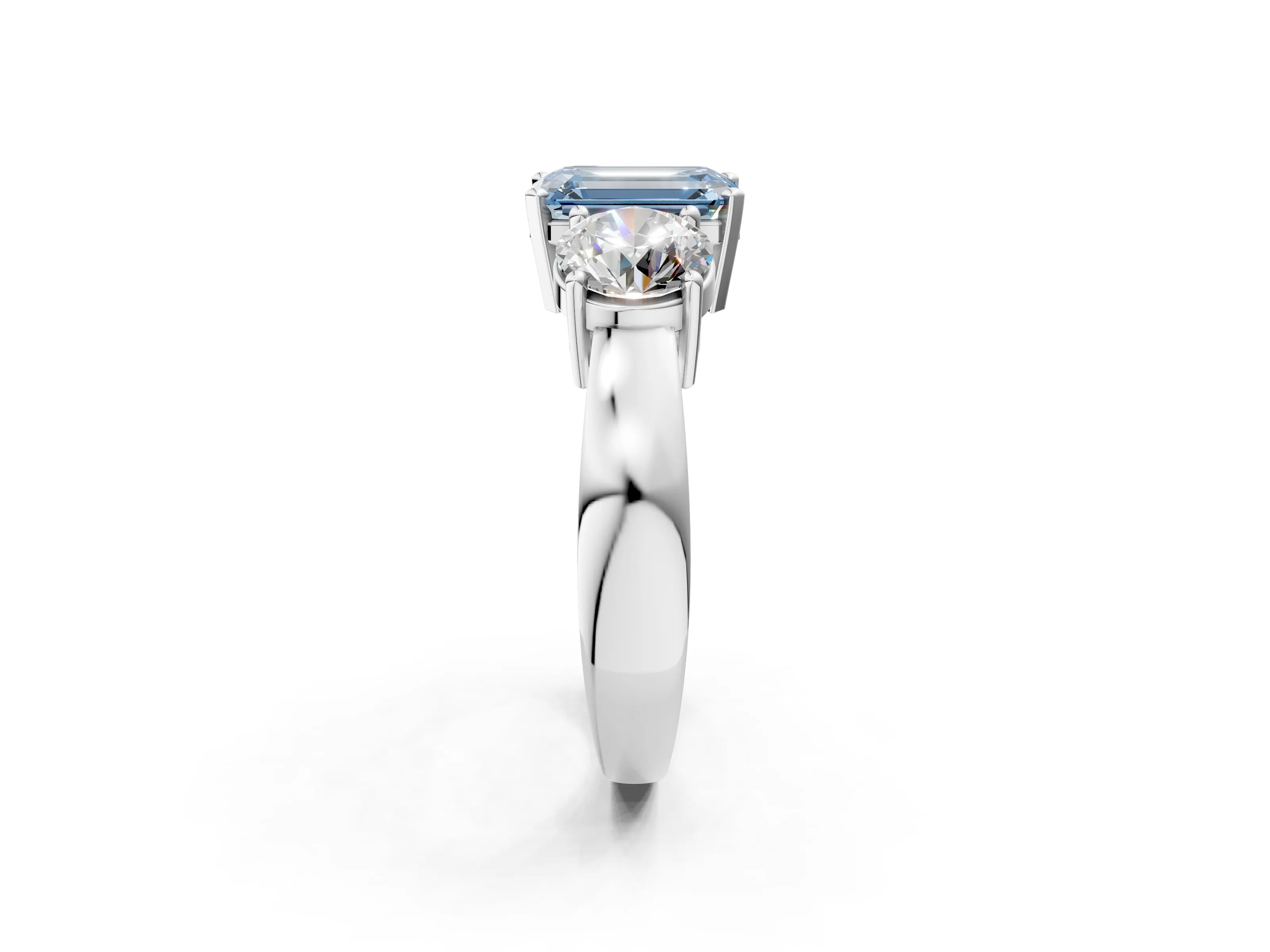 White gold Three-Stone Fancy Blue Emerald Cut Diamond Ring with Round Side Stones, Classic Band, and Four-Prong Setting_2