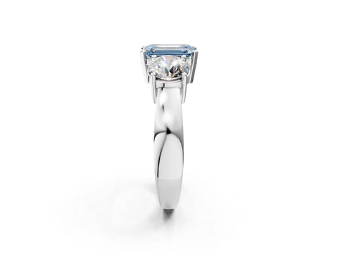 White gold Three-Stone Fancy Blue Emerald Cut Diamond Ring with Round Side Stones, Classic Band, and Four-Prong Setting_2