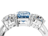 White gold Three-Stone Fancy Blue Emerald Cut Diamond Ring with Round Side Stones, Classic Band, and Four-Prong Setting_4
