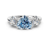 White gold Three-Stone Fancy Blue Heart Cut Cut Diamond Ring with Channel Set Band and Four-Prong Setting_12