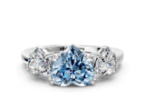 White gold Three-Stone Fancy Blue Heart Cut Cut Diamond Ring with Channel Set Band and Four-Prong Setting_12