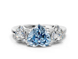 White gold Three-Stone Fancy Blue Heart Cut Cut Diamond Ring with Channel Set Band and Four-Prong Setting_12