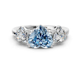 White gold Three-Stone Fancy Blue Heart Cut Cut Diamond Ring with Channel Set Band and Four-Prong Setting_36