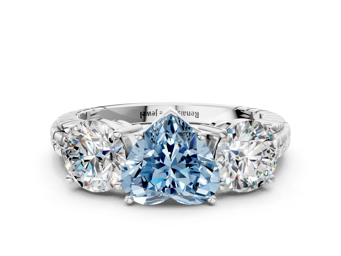 White gold Three-Stone Fancy Blue Heart Cut Cut Diamond Ring with Channel-Set Band and Prong Setting