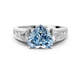 White gold Three-Stone Fancy Blue Heart Cut Cut Diamond Ring with Trillion Side Stones on a Split Shank Band_12