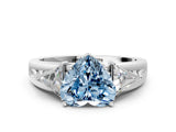 White gold Three-Stone Fancy Blue Heart Cut Cut Diamond Ring with Trillion Side Stones on a Split Shank Band