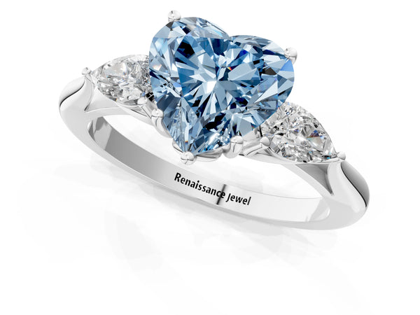 White gold Three-Stone Fancy Blue Heart Cut Diamond Ring with Pear  Side Stones in Four-Prong Setting