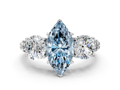 White gold Three-Stone Fancy Blue Marquise Cut Cut Diamond Ring with Channel-Set Band and Prong Setting