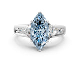 White gold Three-Stone Fancy Blue Marquise Cut Cut Diamond Ring with Trillion Side Stones on a Split Shank Band