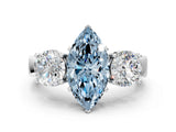White gold Three-Stone Fancy Blue Marquise Cut Diamond Ring with Round Side Stones, Classic Band, and Four-Prong Setting_42