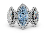 White gold Three-Stone Fancy Blue Marquise Cut Halo Diamond Ring with Pave Band and Four-Prong Setting