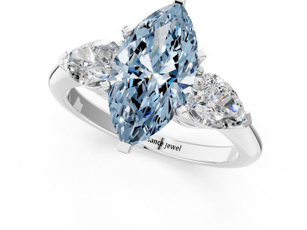Platinum Three-Stone Fancy Blue Marquise Cut Diamond Ring with Pear Side Stones and Four-Prong Setting