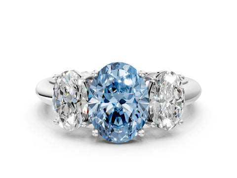 White gold Three-Stone Fancy Blue Oval Cut Cut Diamond Engagement Ring with Prong Setting on a White Gold Band_12
