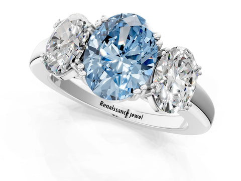 White gold Three-Stone Fancy Blue Oval Cut Cut Diamond Ring with Channel Set Band and Four-Prong Setting_1